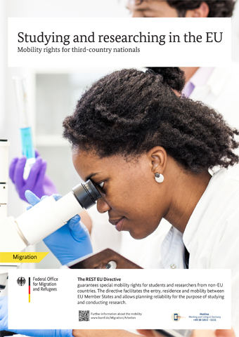 A woman observes something with a microscope A woman observes something with a microscope